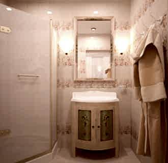 Дизайн трехкомнатной квартиры 77 кв. м в романском стиле. Фото проекта